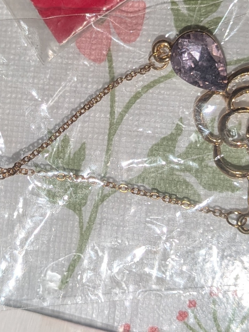 Gold-Tone Flower Necklace with Light Purple Teardrop Stone